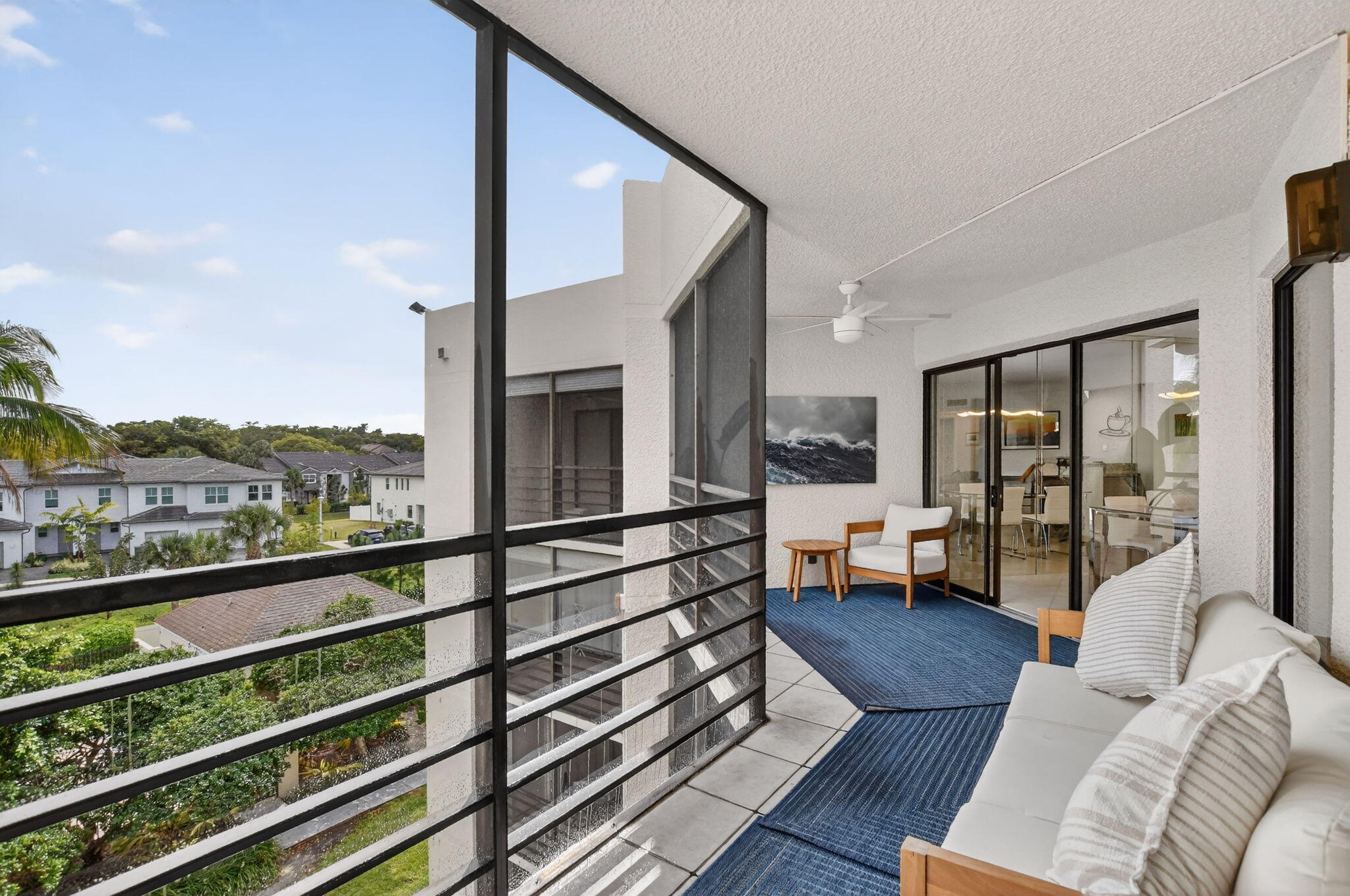 5851 Camino Del Sol, Unit 402 Boca Raton, FL 33433 - Photo 20 of 40 a living room with furniture