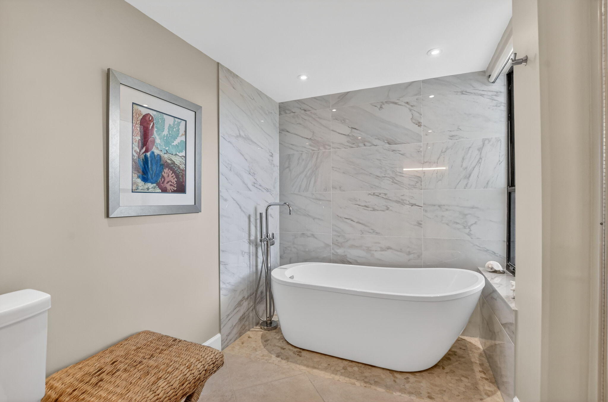 5851 Camino Del Sol, Unit 402 Boca Raton, FL 33433 - Photo 27 of 40 a bathroom with a bathtub and a toilet