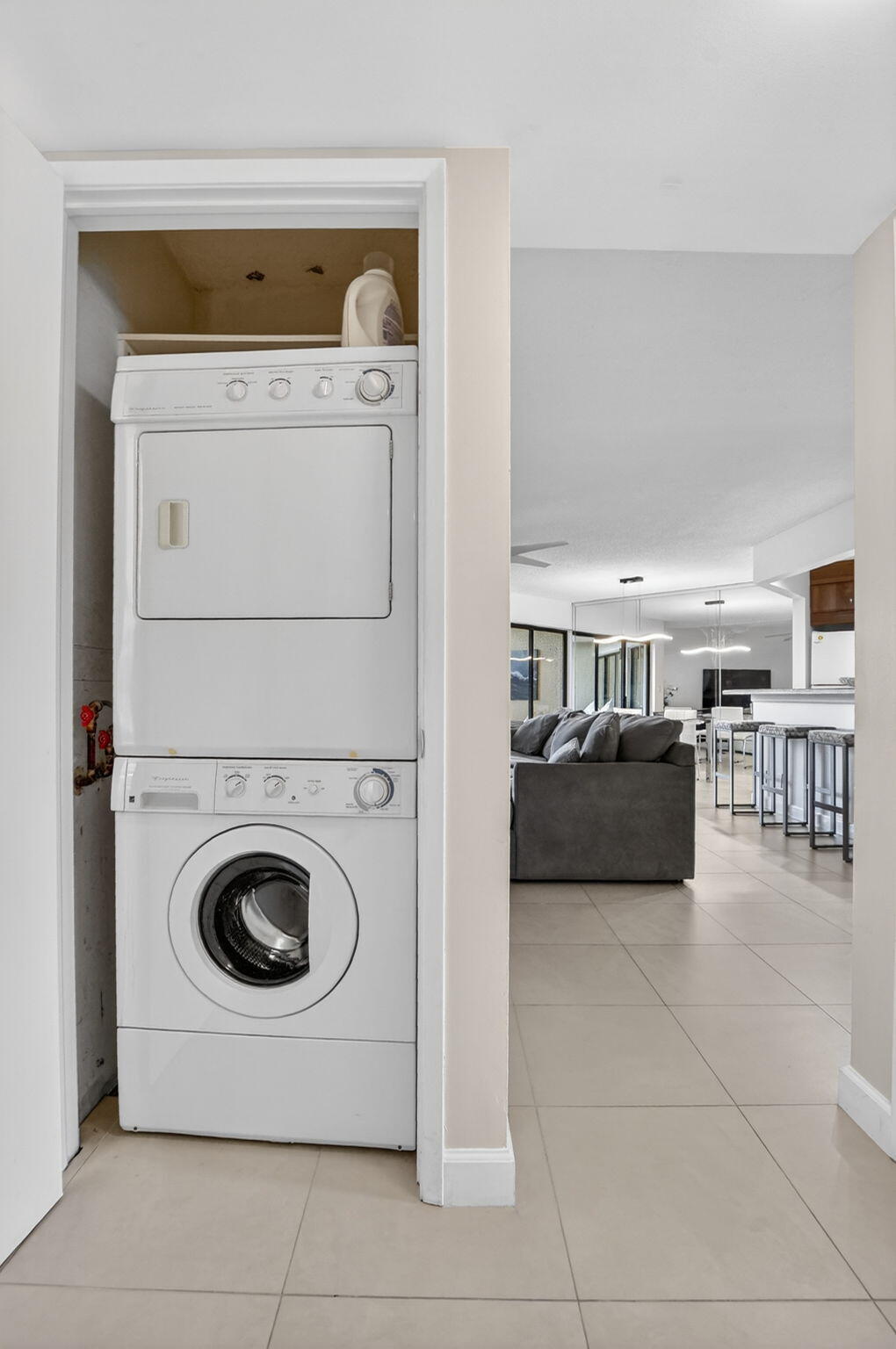 5851 Camino Del Sol, Unit 402 Boca Raton, FL 33433 - Photo 34 of 40 a view of living room washer and dryer