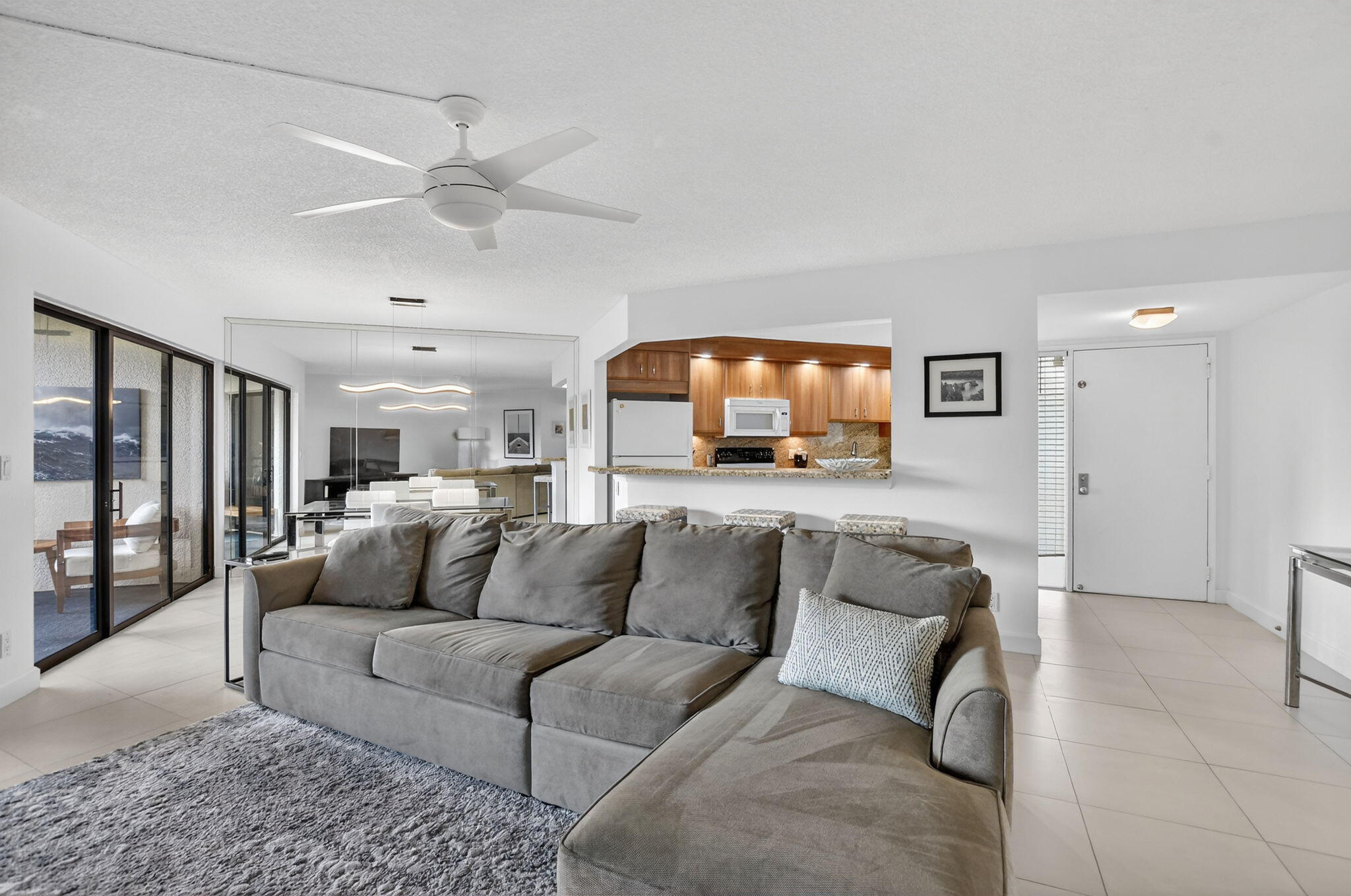 5851 Camino Del Sol, Unit 402 Boca Raton, FL 33433 - Photo 6 of 40 LIVING ROOM