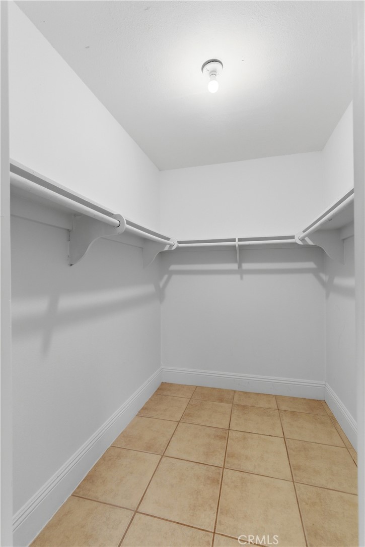 600 West 3rd Street, Unit A210 Santa Ana, CA 92701 - Photo 13 of 30 a view of a room with an empty racks