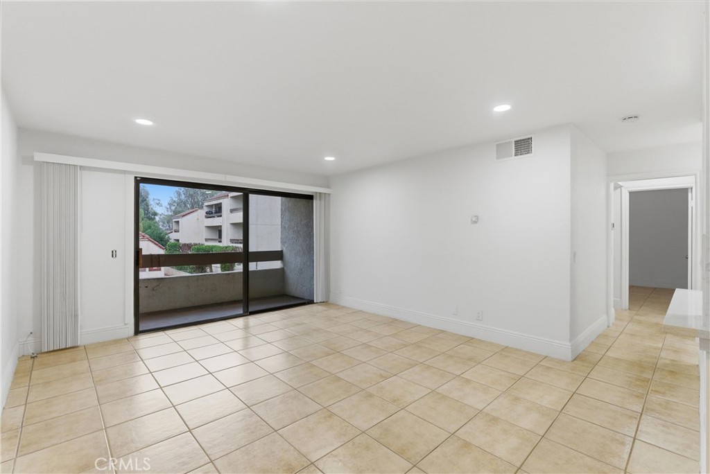 600 West 3rd Street, Unit A210 Santa Ana, CA 92701 - Photo 2 of 30 a view of an empty room with a window