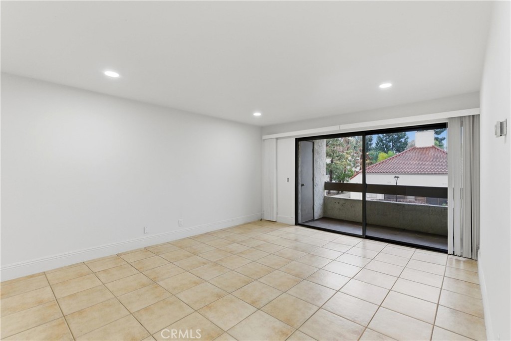 600 West 3rd Street, Unit A210 Santa Ana, CA 92701 - Photo 23 of 30 a view of an empty room with a window
