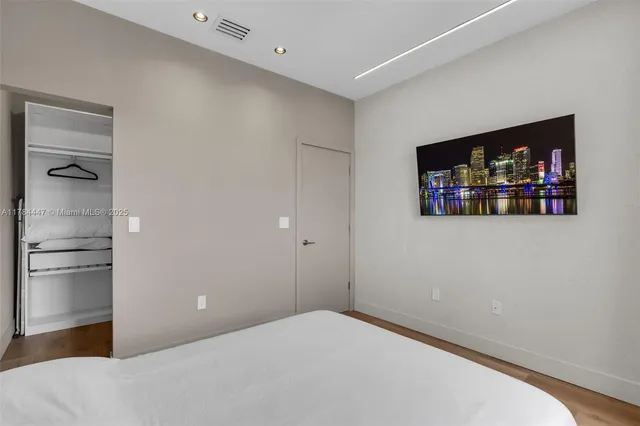 a view of kitchen with a refrigerator
