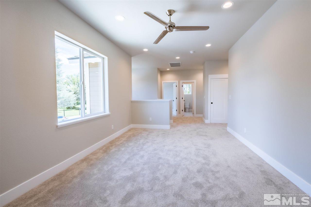 1605 Elizabeth Street Reno, NV 89509 - Photo 15 of 25 a view of a livingroom with a ceiling fan and window