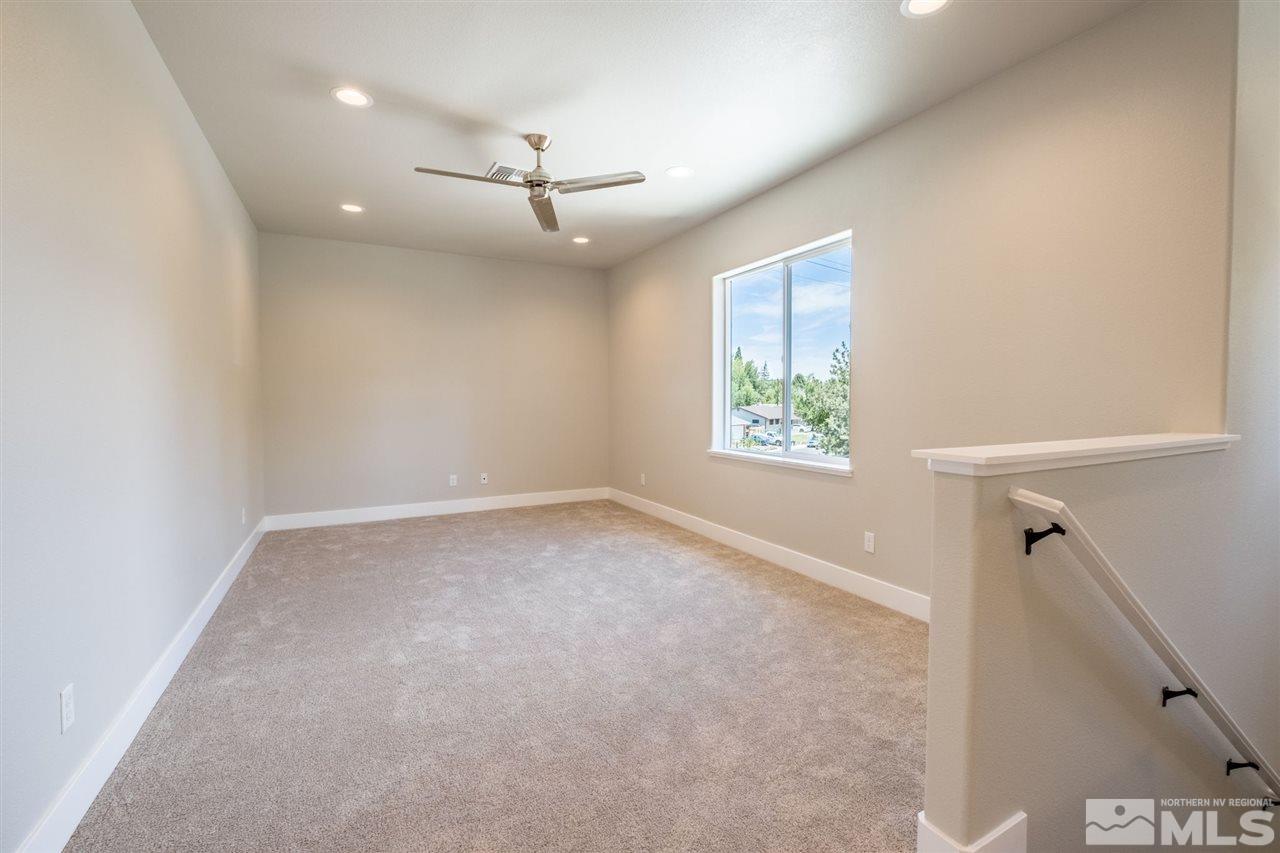 1605 Elizabeth Street Reno, NV 89509 - Photo 18 of 25 wooden floor in an empty room with a window
