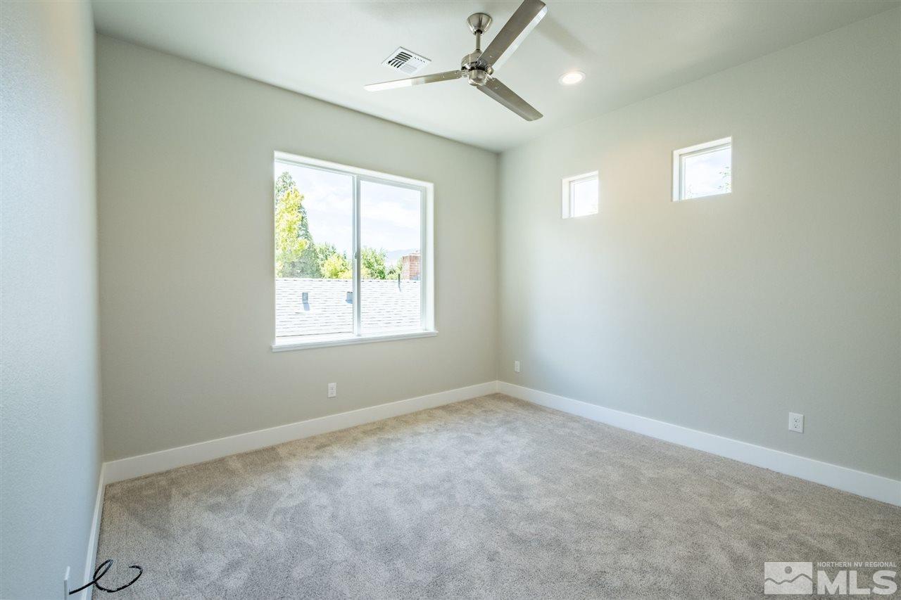 1605 Elizabeth Street Reno, NV 89509 - Photo 19 of 25 a view of an empty room with a window