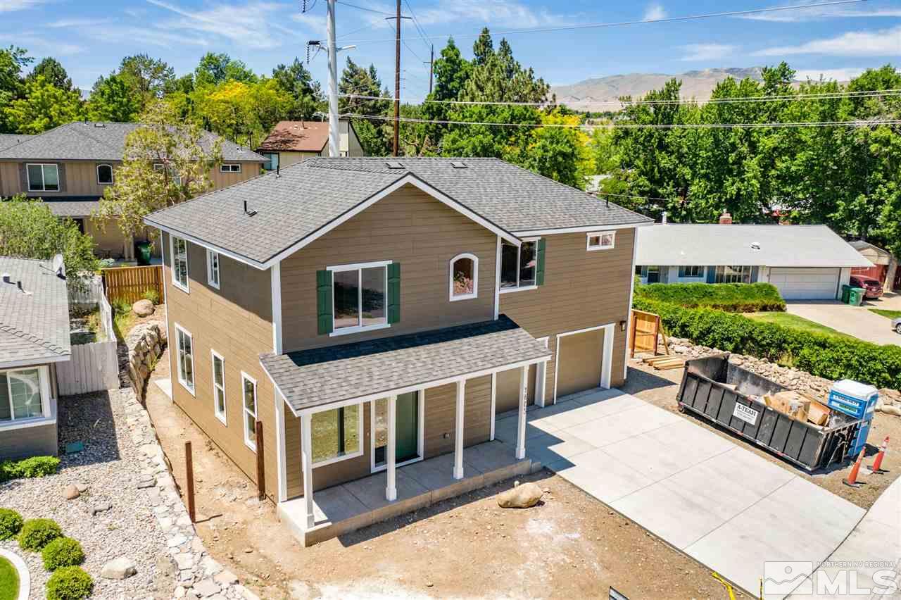 1605 Elizabeth Street Reno, NV 89509 - Photo 25 of 25 a view of a house with a yard and potted plants