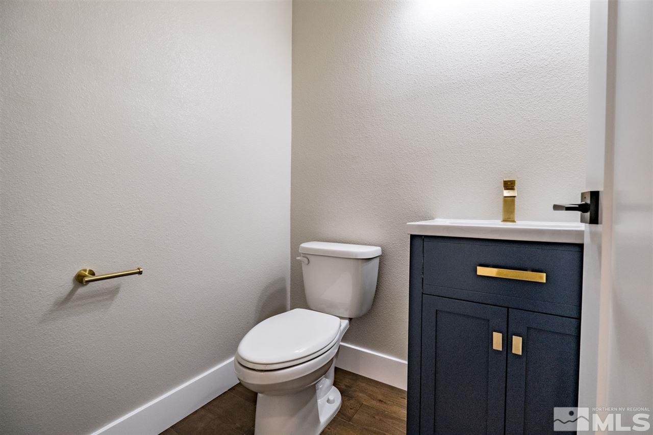 1605 Elizabeth Street Reno, NV 89509 - Photo 10 of 25 a bathroom with a toilet and a sink