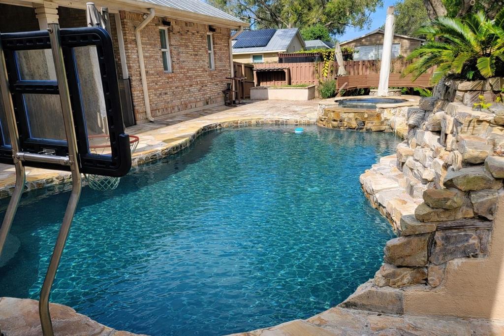 3110 Lost Tree Boulevard Fort Pierce, FL 34981 - Photo 2 of 6 Resort Style Heated Pool and Spa with outdoor shower and 1/2 bath.