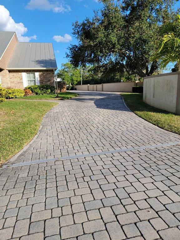 3110 Lost Tree Boulevard Fort Pierce, FL 34981 - Photo 3 of 6 Extended driveway that can fit 10 + vehicles.