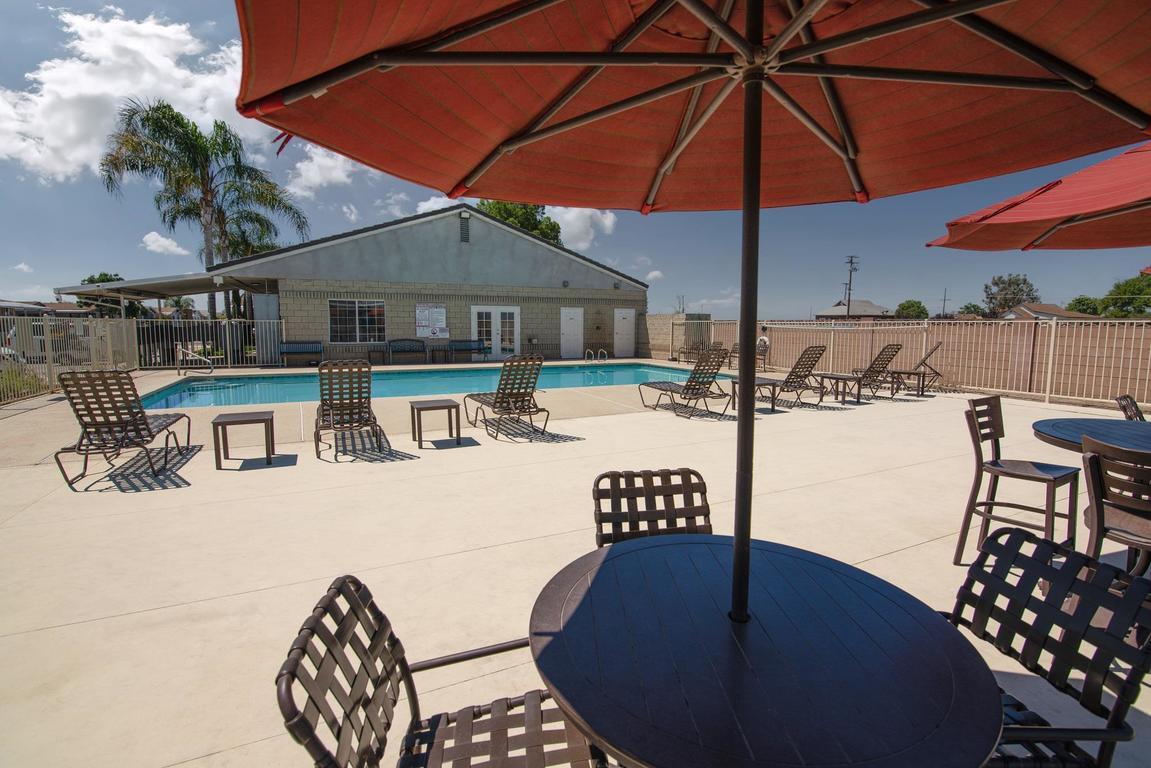 900 East Rankin Road, Unit 5 Tulare, CA 93274 - Photo 25 of 26 a view of outdoor space yard deck patio and outdoor kitchen