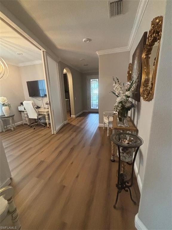 1599 Marton Court Naples, FL 34113 - Photo 7 of 22 a view of a workspace with furniture and a window