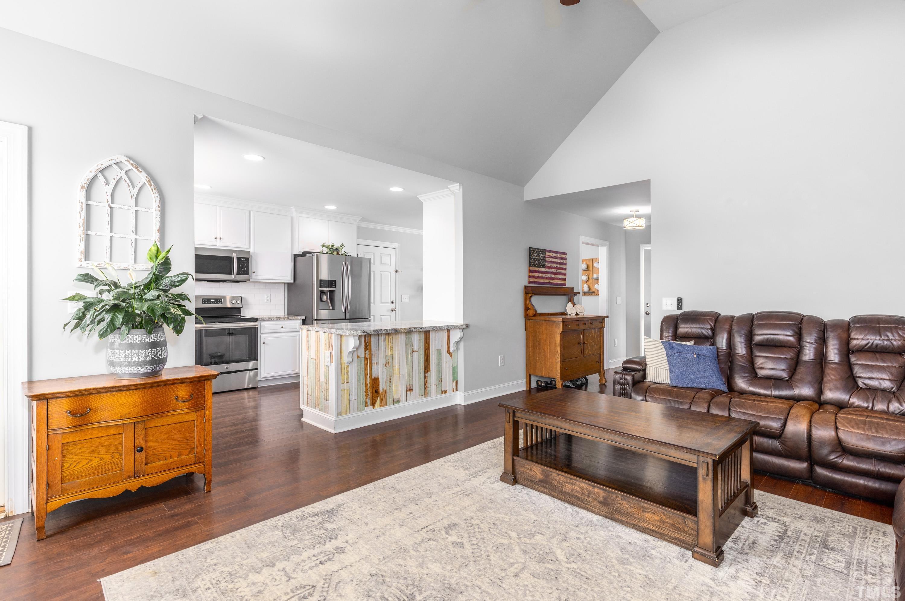 5333 Needham Road Bailey, NC 27807 - Photo 3 of 20 a living room with furniture and wooden floor