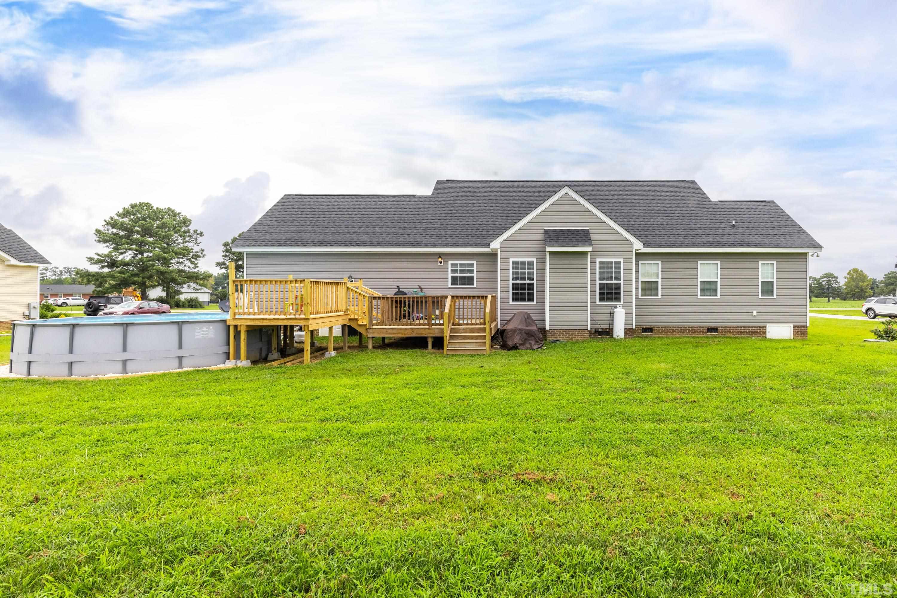 5333 Needham Road Bailey, NC 27807 - Photo 8 of 20 a front view of a house with a garden