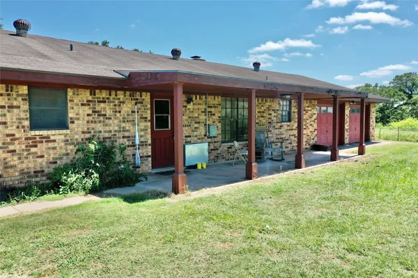 a view of a porch with a backyard