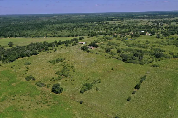 a view of a green field with lots of green space