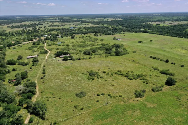 a view of a lush green field