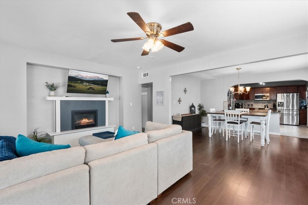 3974 5th Street Riverside, CA 92501 - Photo 9 of 45 a living room with furniture and a fireplace