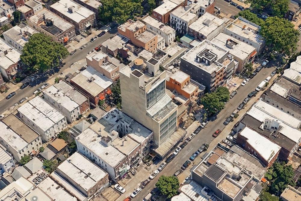 849 57th Street, Unit 101 Brooklyn, NY 11220 - Photo 14 of 14 an aerial view of a city