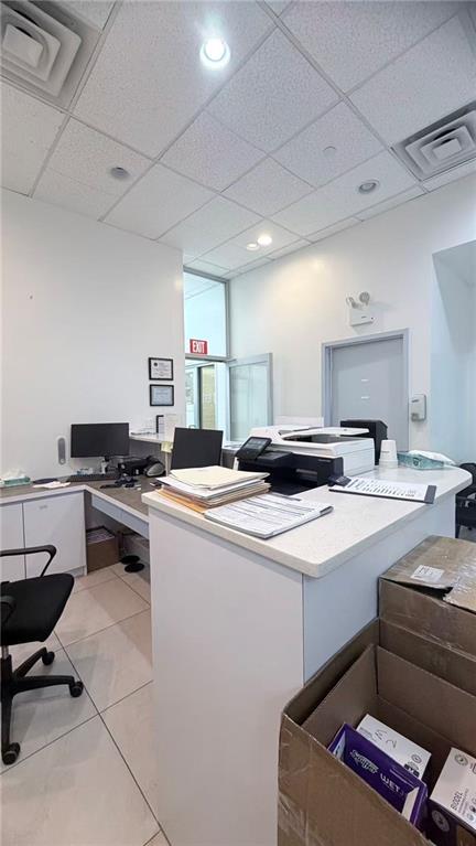 849 57th Street, Unit 101 Brooklyn, NY 11220 - Photo 6 of 14 a kitchen that has a sink and a stove in it