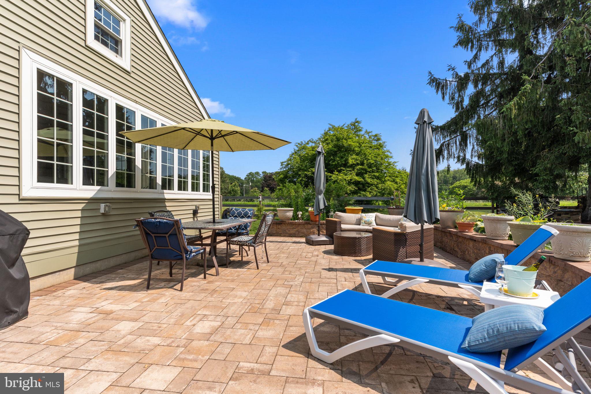 410 Island Road Columbus, NJ 08022 - Photo 35 of 43 a view of a patio with swimming pool table and chairs