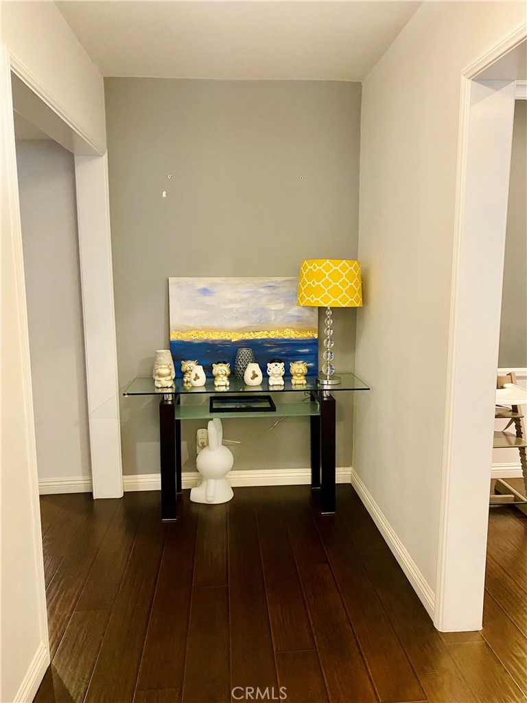 3187 Sunnyslope Boulevard Pasadena, CA 91107 - Photo 2 of 15 a view of an empty room with wooden floor