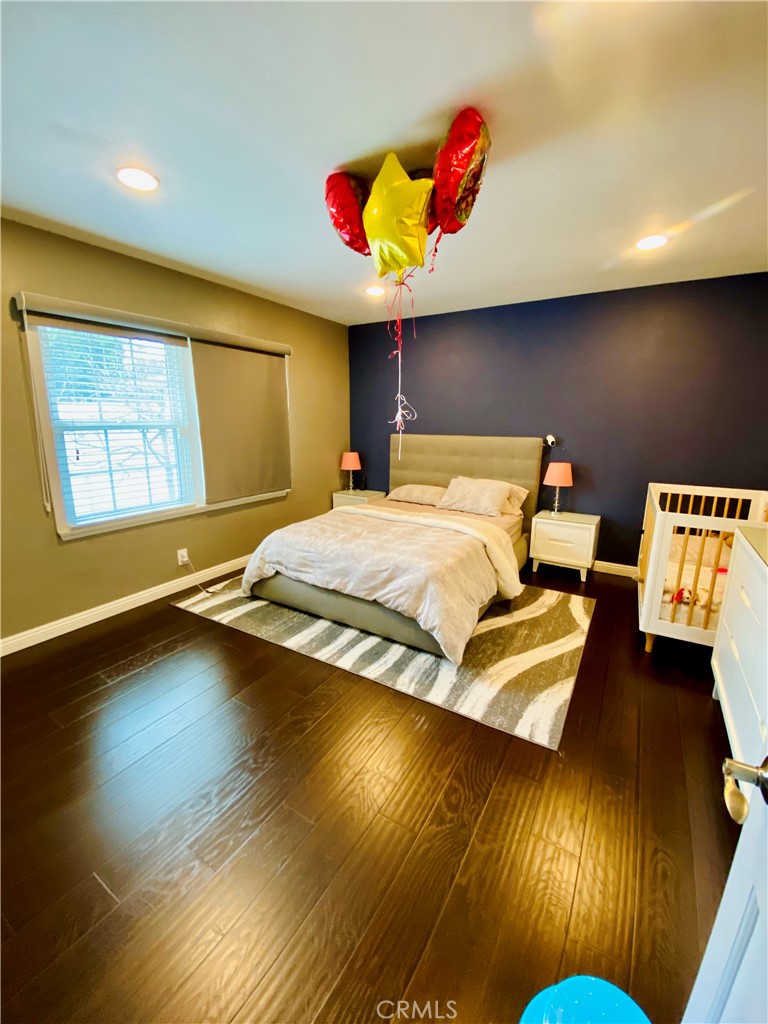 3187 Sunnyslope Boulevard Pasadena, CA 91107 - Photo 7 of 15 a bedroom with bed and window