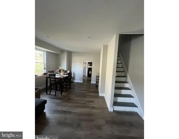 a view of dining room with furniture and a livingroom