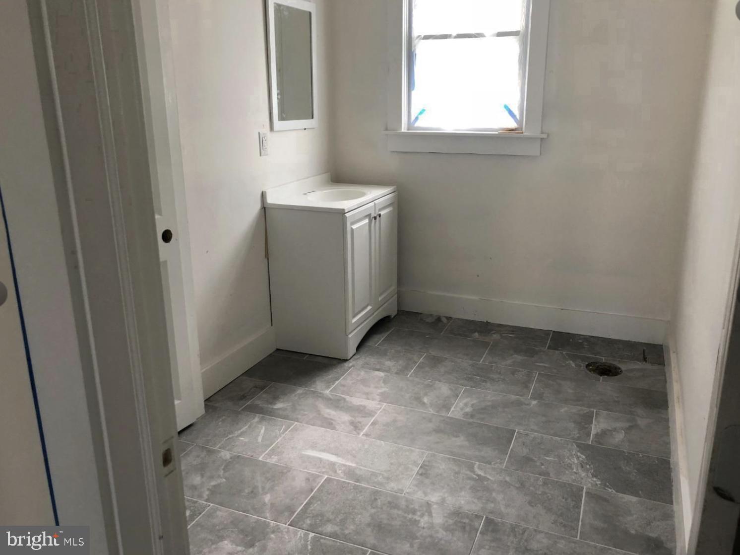 28 Zane Street, Unit 28 Glassboro, NJ 08028 - Photo 10 of 10 a view of a bathroom with a sink