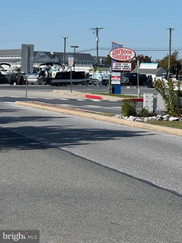 a view of a building and car parked
