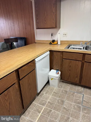 a room with a sink and a stove