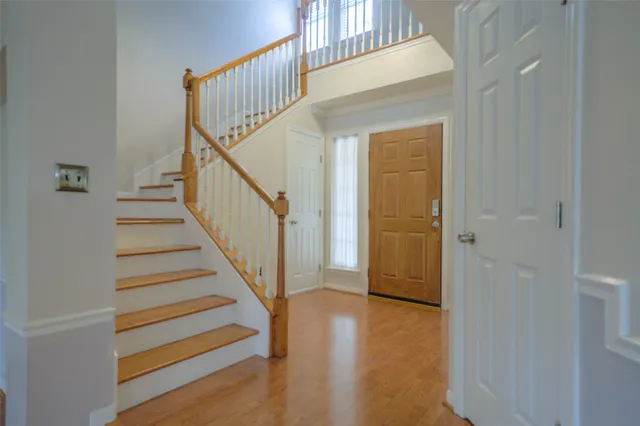a view of entryway with wooden floor