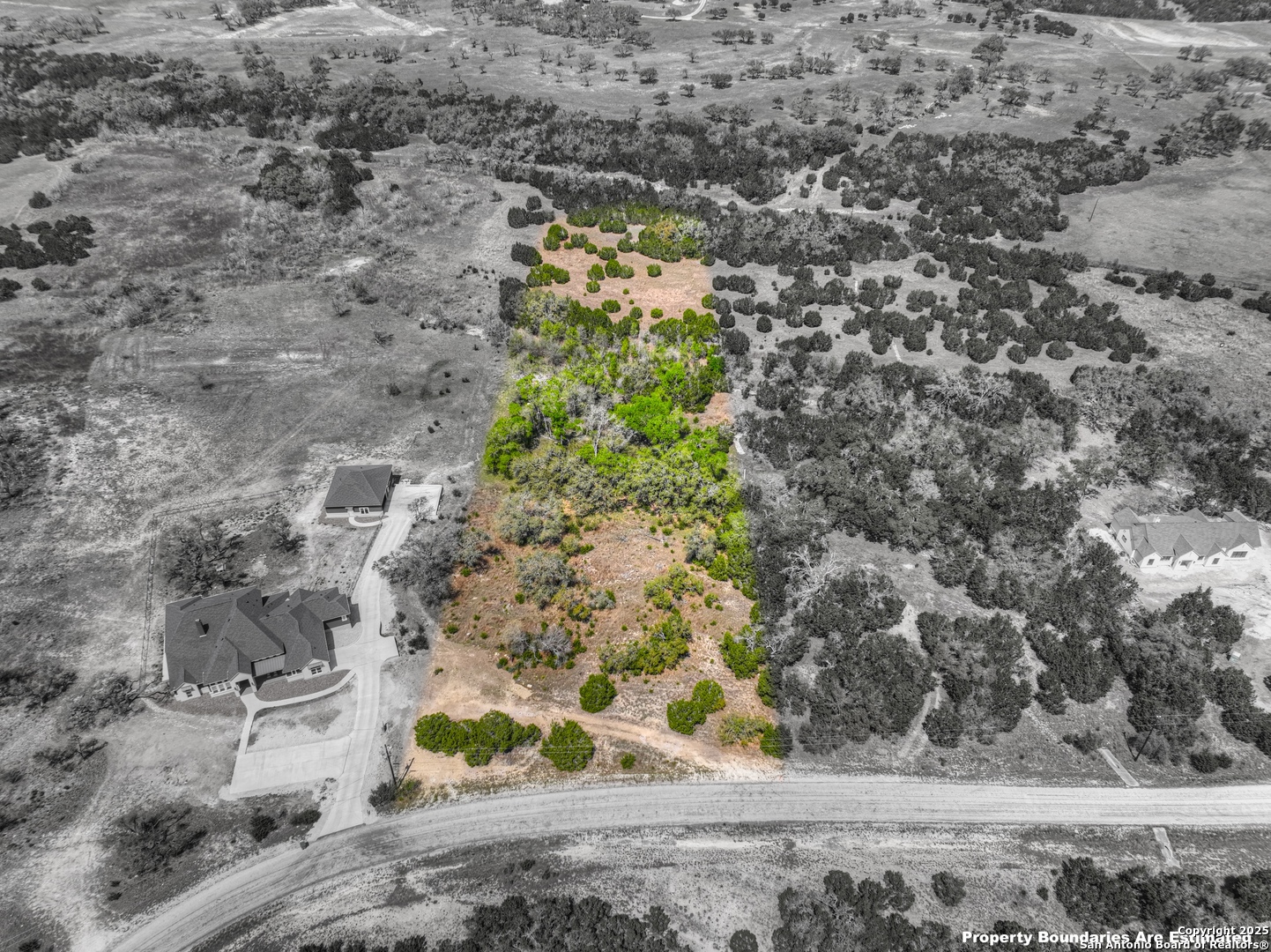 327 Vista View Place Spring Branch, TX 78070 - Photo 4 of 21 a view of a garden with flowers