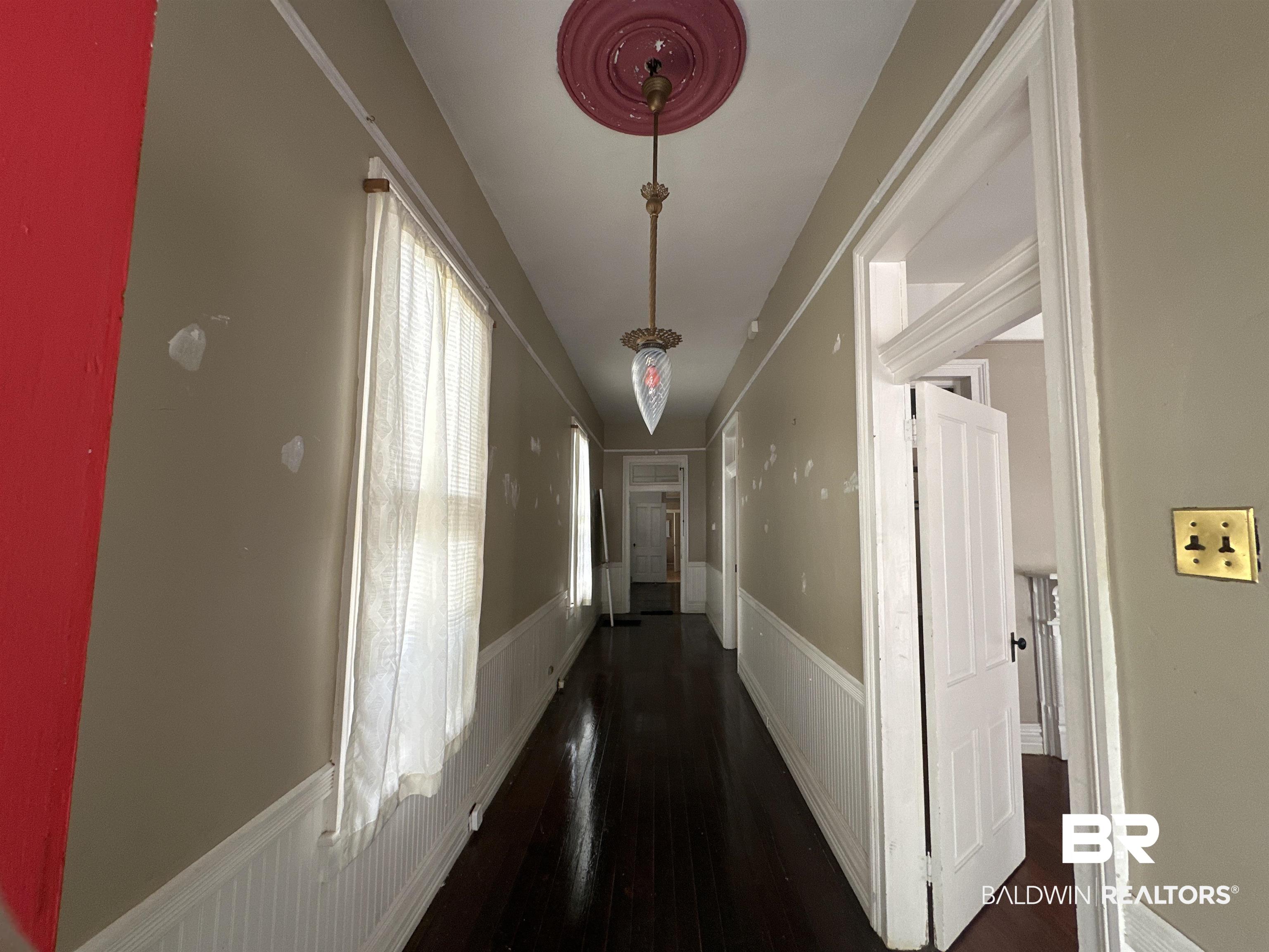1119 Old Shell Road Mobile, AL 36604 - Photo 17 of 22 Hall featuring dark wood-type flooring