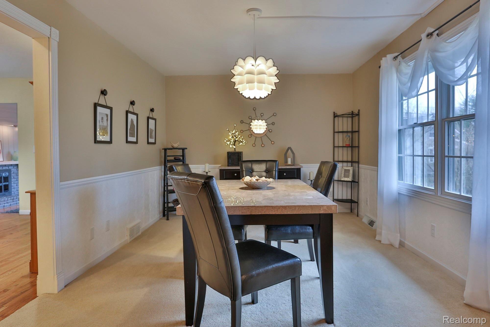 8356 Rucker Road Grosse Ile, MI 48138 - Photo 2 of 26 Space to entertain in the formal dining room.