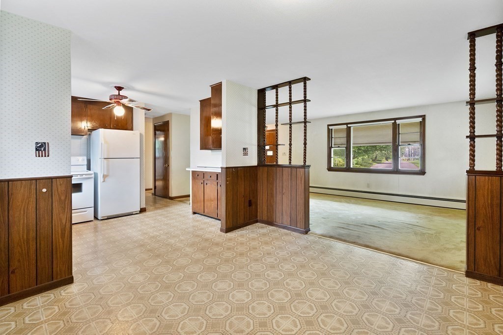 588 Granby Road Chicopee, MA 01013 - Photo 8 of 32 a view of a kitchen with furniture and a window