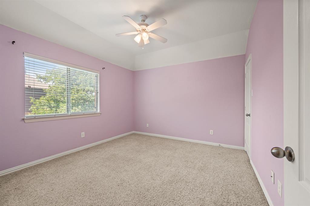 808 Briar Ridge Drive Keller, TX 76248 - Photo 30 of 40 Carpeted room featuring a ceiling fan, a window with horizontal blinds, and a white interior door