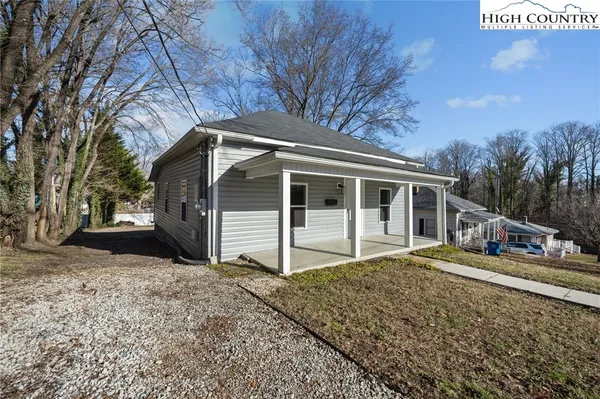 a house with trees in front of it