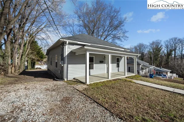 a house with trees in front of it