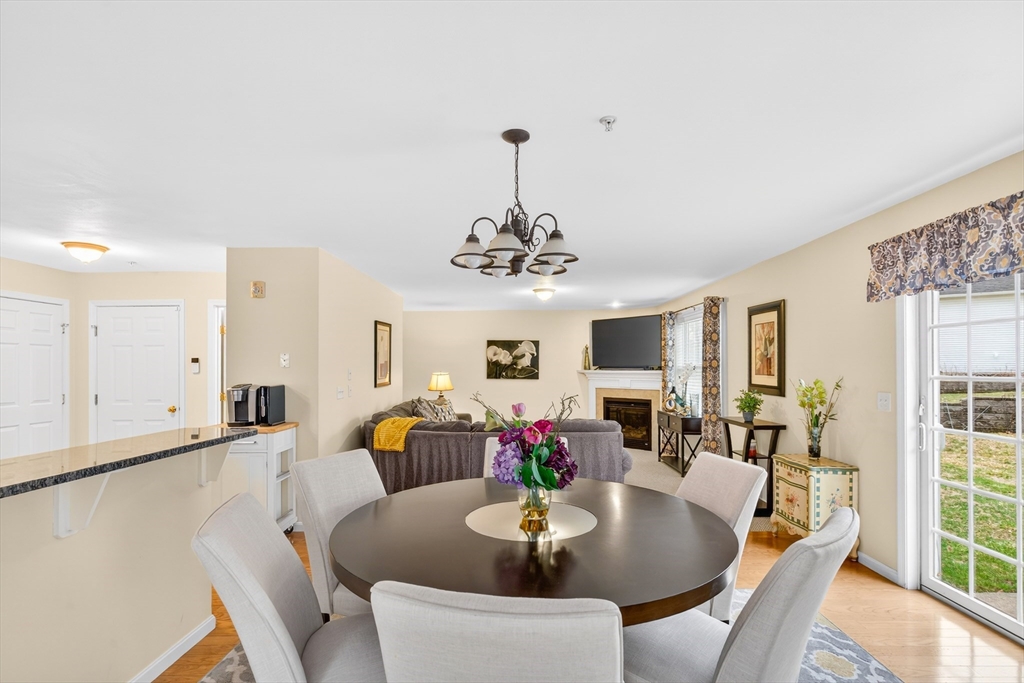 615 Nashua Road, Unit 9 Dracut, MA 01826 - Photo 16 of 38 a view of a dining room with furniture window and outside view