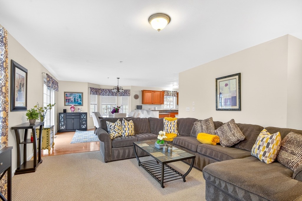 615 Nashua Road, Unit 9 Dracut, MA 01826 - Photo 19 of 38 a living room with furniture and a couch