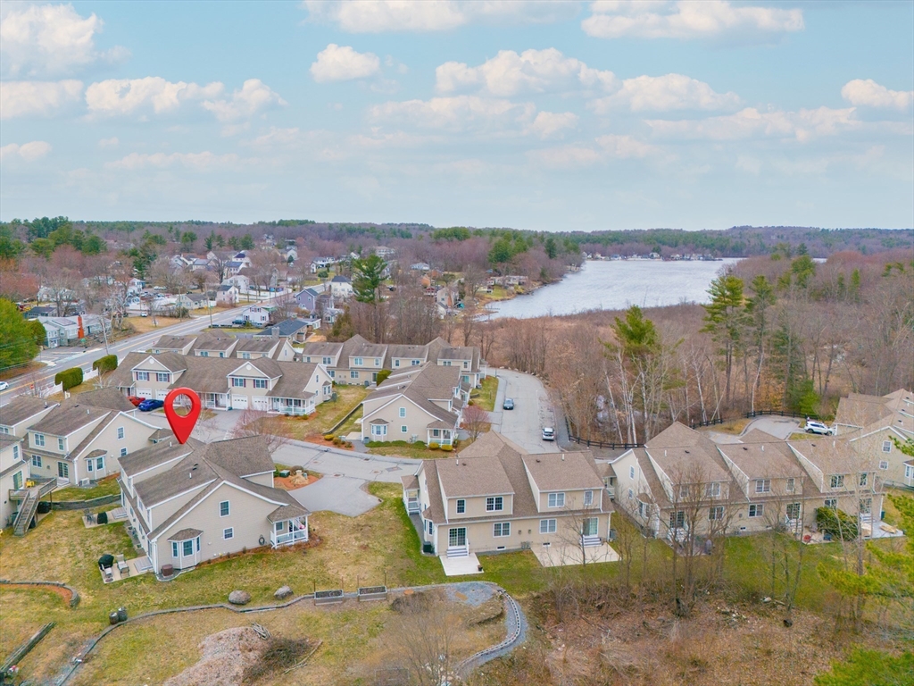 615 Nashua Road, Unit 9 Dracut, MA 01826 - Photo 37 of 38 an aerial view of a houses with outdoor space