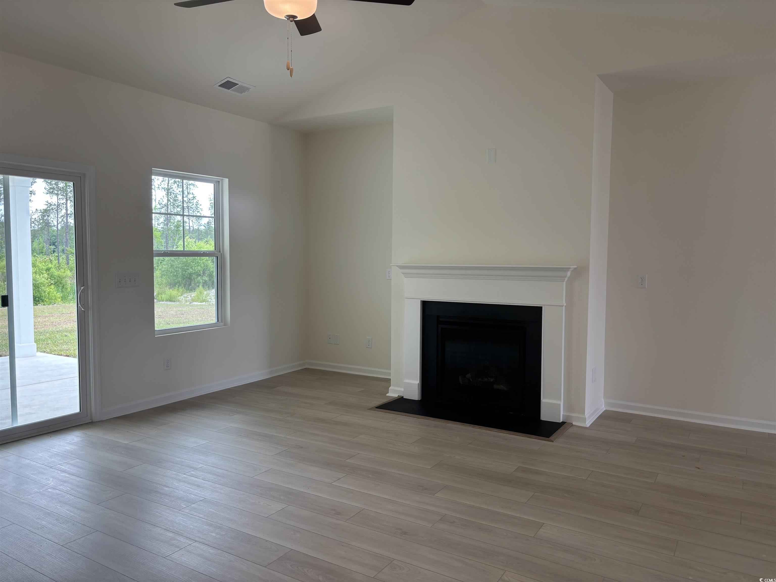 7059 Shady Grove Road Conway, SC 29527 - Photo 14 of 37 Unfurnished living room featuring visible vents, c