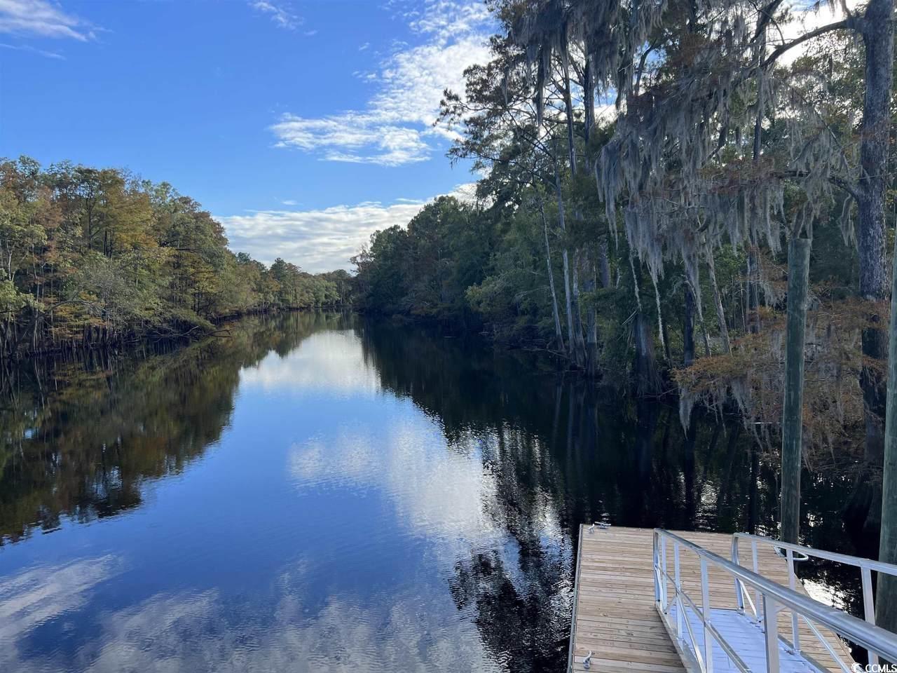 7059 Shady Grove Road Conway, SC 29527 - Photo 28 of 37 Water view featuring a boat dock and a view of tre