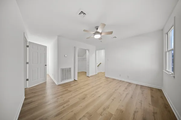 a view of a room with racks on the wall