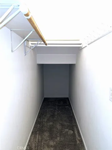 a view of a house with backyard and porch