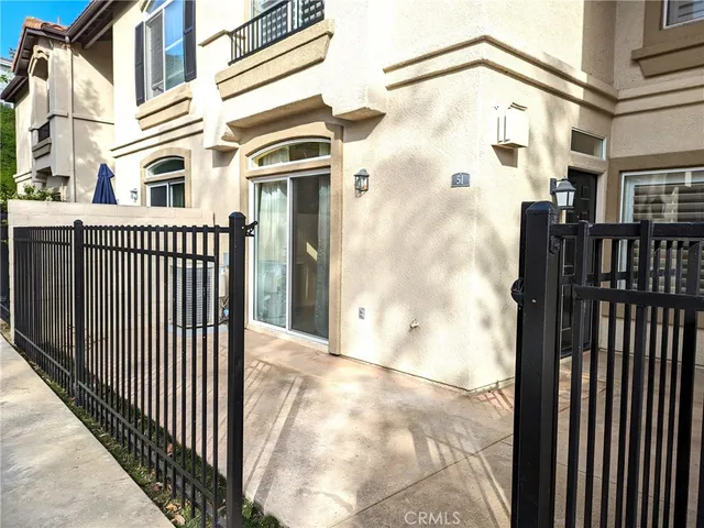 a view of a terrace with a garden