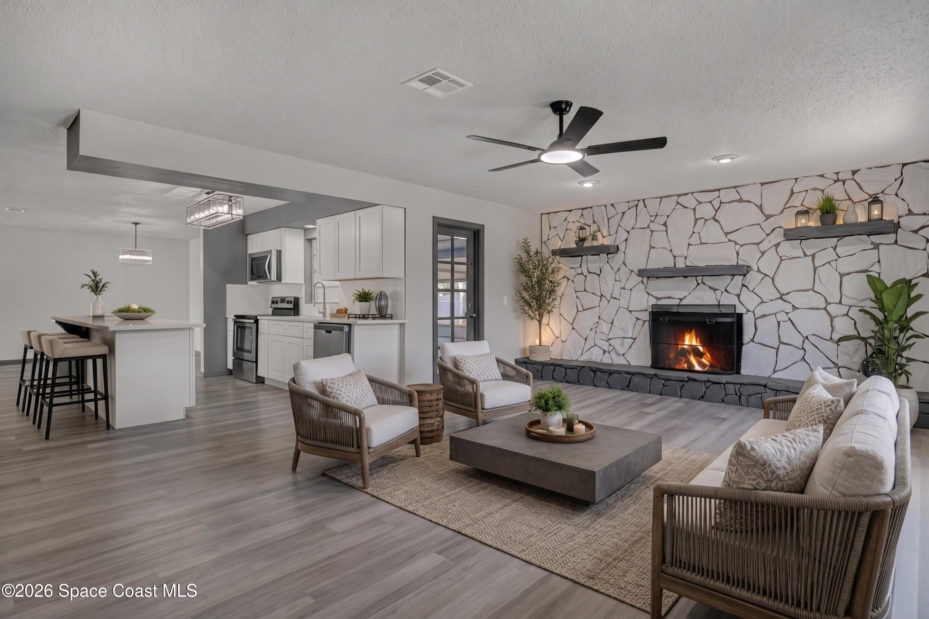 999 Castile Road Southeast Palm Bay, FL 32909 - Photo 12 of 45 Familyroom with fireplace
