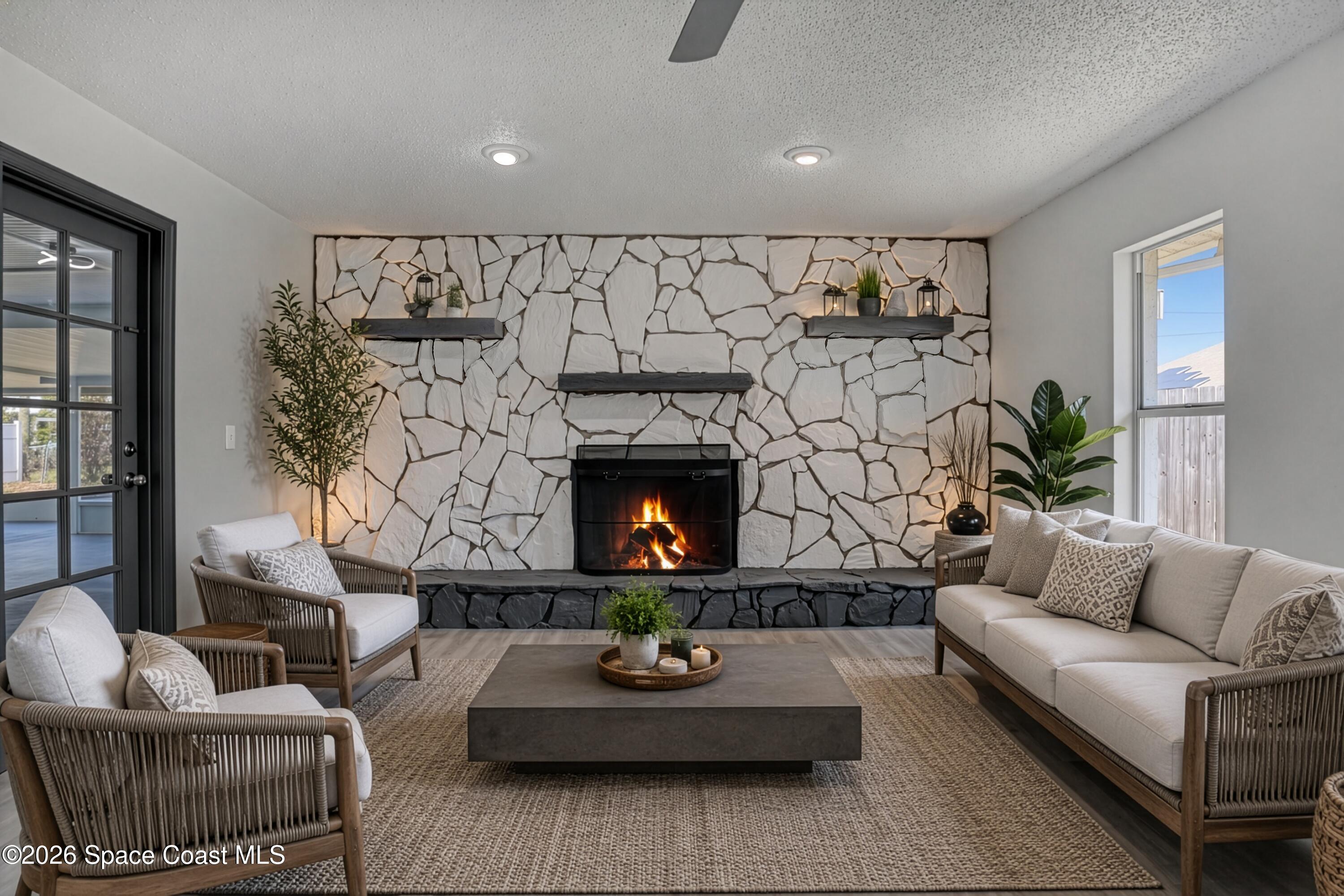 999 Castile Road Southeast Palm Bay, FL 32909 - Photo 13 of 45 Familyroom with fireplace